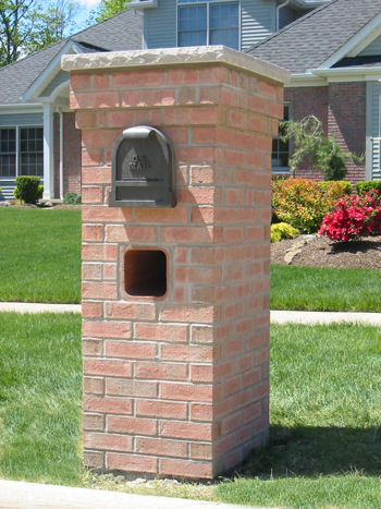 We can install a brick mailbox pillar that is impervious to snow plows